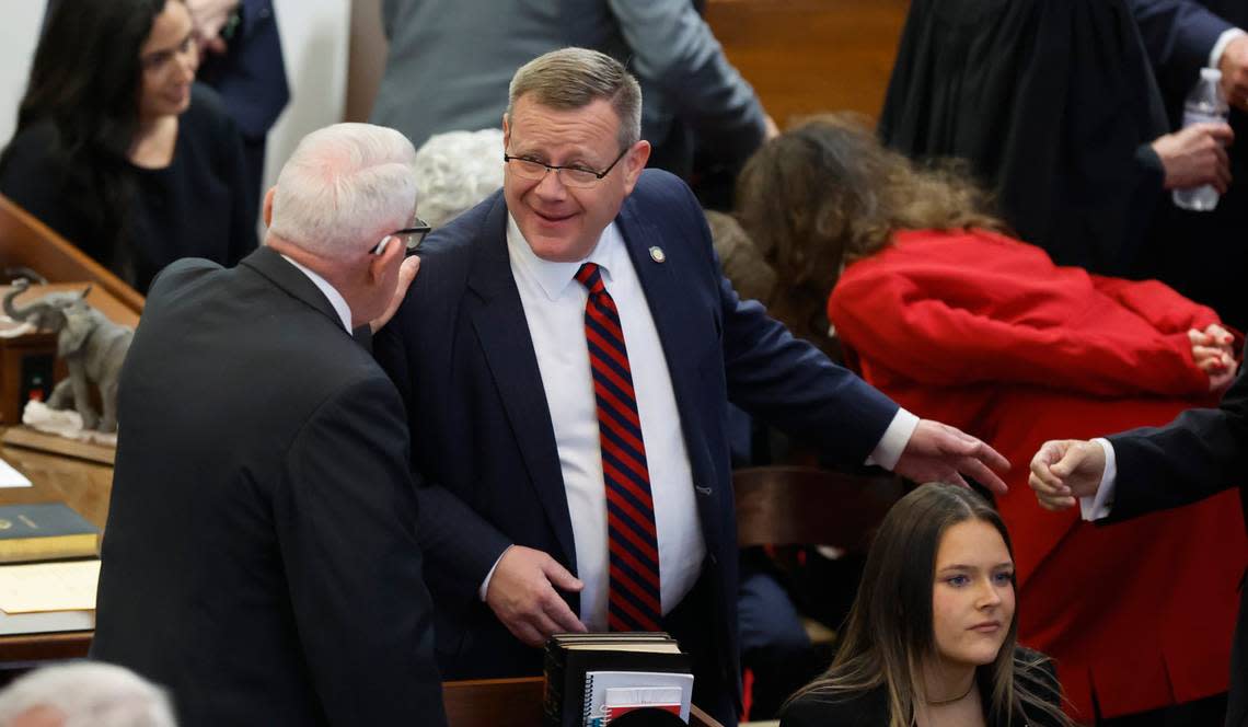 Speaker of the House Tim Moore talks with Rep. George Cleveland before the opening session of the N.C. House of Representatives Wednesday, Jan. 11, 2023.