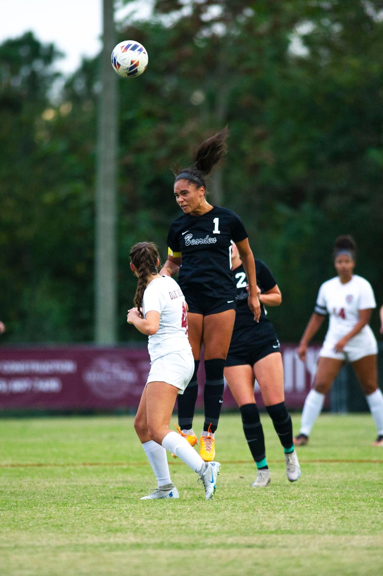 Bearden's Nyla Blue (1) heads the ball during the Class AAA Region 2 tournament Oct. 17. She'll be playing at the University of Tennessee, Knoxville.