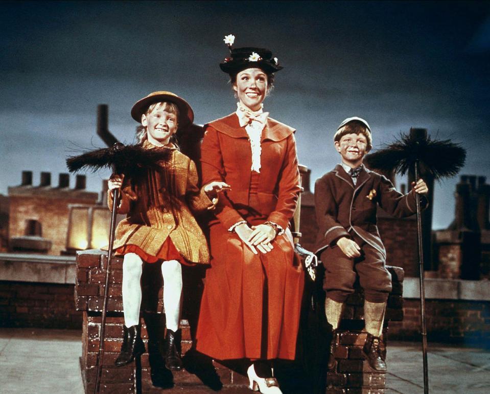 Karen Dotrice, Julie Andrews and Matthew Garber and Jane Banks, Mary Poppins and Michael Banks in the 1964 Disney film. (Alamy)