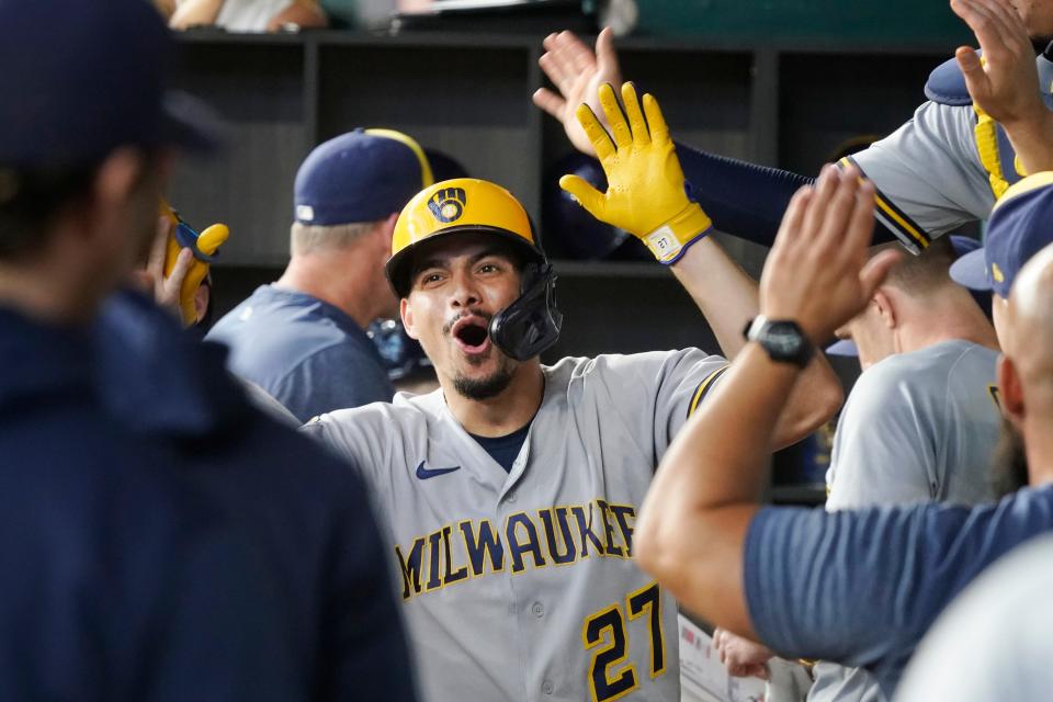 Willy Adames celebrates in the dugout with teammates after hitting a solo home run during the sixth inning Saturday.
