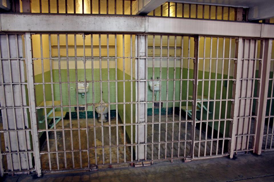 Old cells within historical prison building on Alcatraz island.