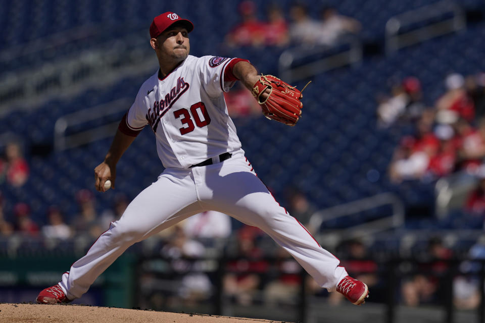 Washington Nationals relief pitcher Paolo Espino delivers a pitch during the first inning of a baseball game against the Pittsburgh Pirates, Wednesday, June 16, 2021, in Washington. (AP Photo/Carolyn Kaster)