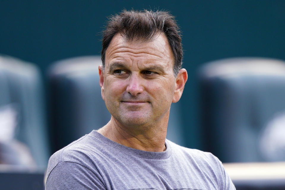 FILE - Sports agent Drew Rosenhaus watches warmups before a preseason NFL football game between the Philadelphia Eagles and the New England Patriots on Aug. 19, 2021, in Philadelphia. Much like many of Twitter's hundreds of millions of users, professional sports stars and celebrities from the entertainment world are dealing with the chaos and uncertainty surrounding the microblogging app since Elon Musk took it over and began trimming the staff and making other changes. Rosenhaus said he longs for the days “when you could just look at the blue mark and know it was real.” (AP Photo/Chris Szagola, File)