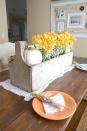 <p>Pack a whitewashed wooden box with fresh flowers for the holiday festivities. Once the party ends, replace 'em with artificial blooms and keep it out year-round. </p><p><em><a href="http://littlevintagenest.com/vintage-thanksgiving-table/" rel="nofollow noopener" target="_blank" data-ylk="slk:See more at Little Vintage Nest »;elm:context_link;itc:0;sec:content-canvas" class="link ">See more at Little Vintage Nest »</a></em></p>