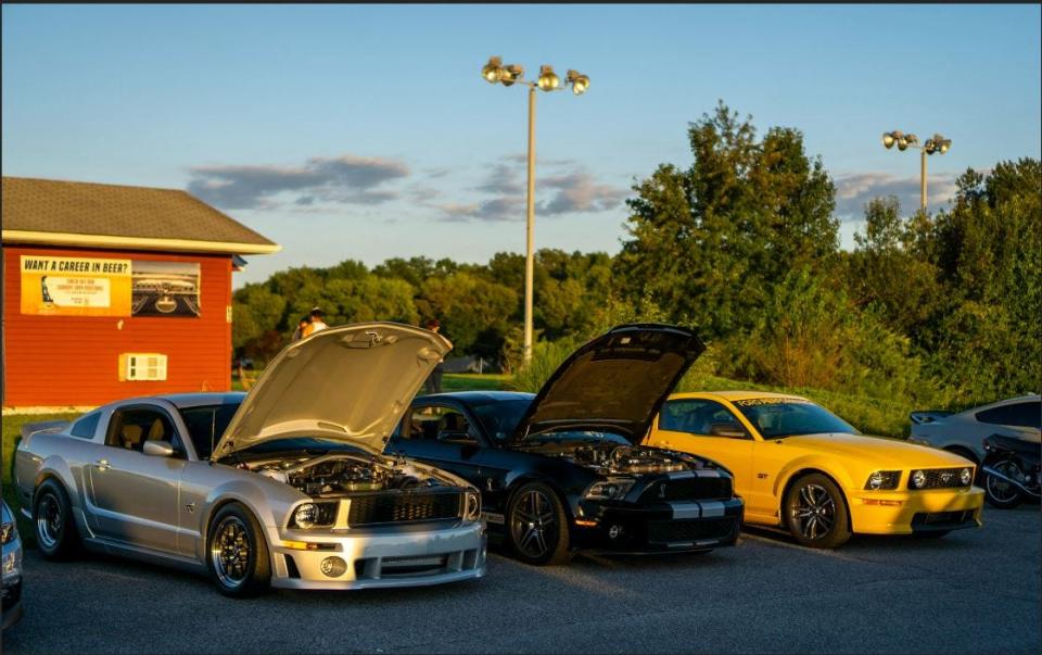 Cars show off their engines in front of Pit Daddy's BBQ outside Smyrna, Delaware at a car meet on August 31, 2023.
(Credit: Provided by Jake Voshell)
