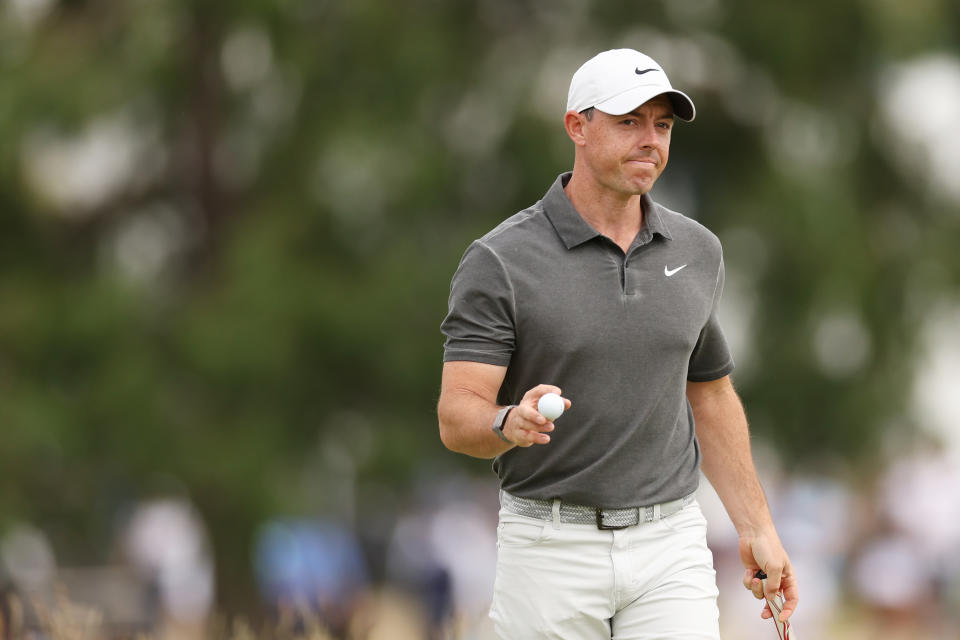 Rory McIlroy of Northern Ireland reacts to his putt on the tenth greenduring the first round of the 123rd U.S. Open Championship