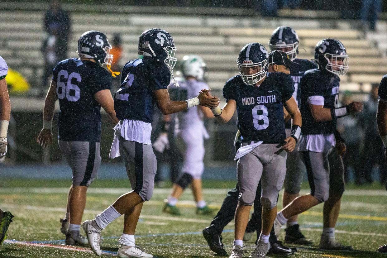 Middletown South's Donovan Summey celebrates a touchdown with Jake Czwakiel during the Mainland vs. Middletown South NJSIAA Central Group 4 championship football game at Middletown High School South in Middletown, NJ Friday, November 11, 2022. 