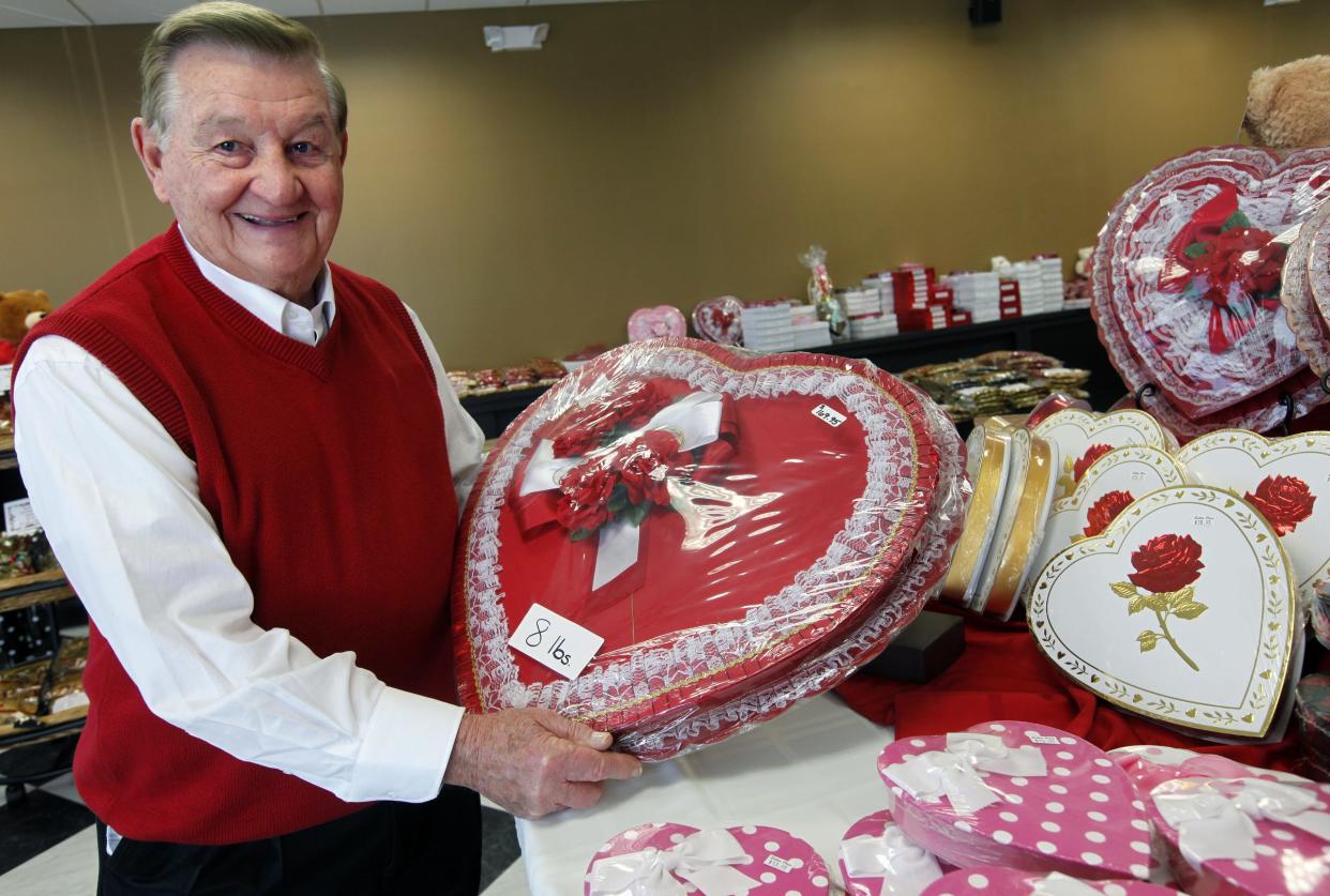 Esther Price CEO Jim Day holds a heart containing 8 pounds of candy at the Esther Price Candies store in Bridgetown in 2010.