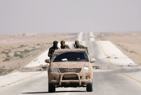 A truck of Syrian Democratic Forces (SDF) is seen in the eastern of Deir al Zor, Syria September 12, 2017.REUTERS/Rodi Said