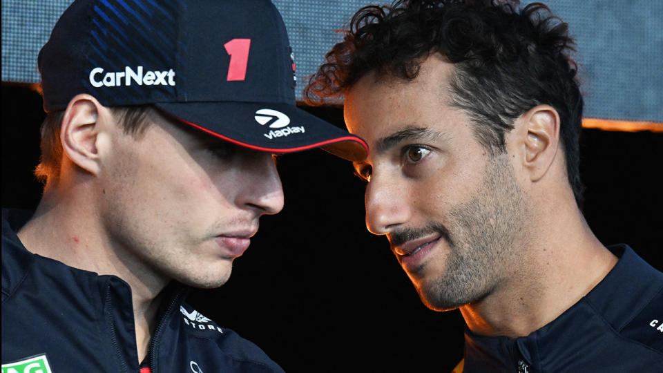 Daniel Ricciardo speaks to Red Bull teammate Max Verstappen.