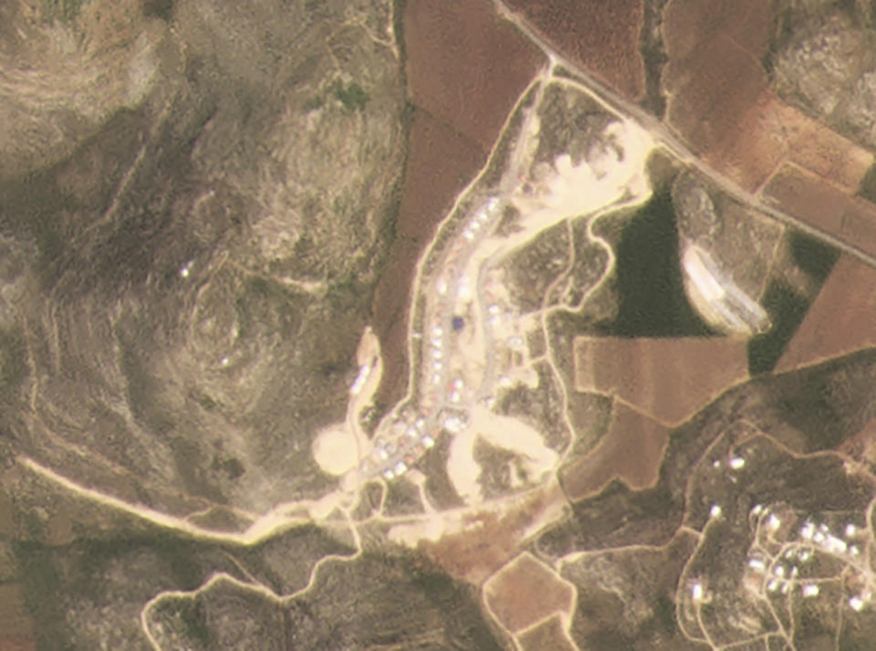 This satellite image provided by Planet Labs Inc. shows the West Bank Jewish settlement of Amichai on March 16, 2021. Satellite photos and data obtained by the AP document for the first time the full impact of the pro-settlement policies of then-President Donald Trump. (Planet Labs Inc. via AP)