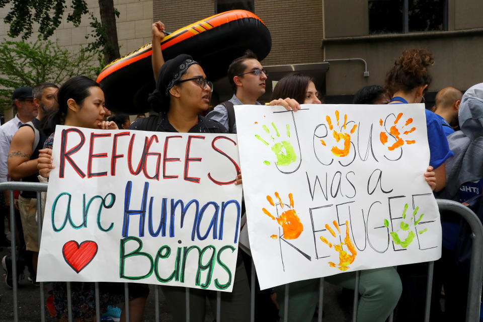 <p>Demonstrators holds up signs and yell anti-Trump chants at a rally against Trump administration immigration policies outside the New York City on June 20, 2018. (Photo: Gordon Donovan/Yahoo News) </p>