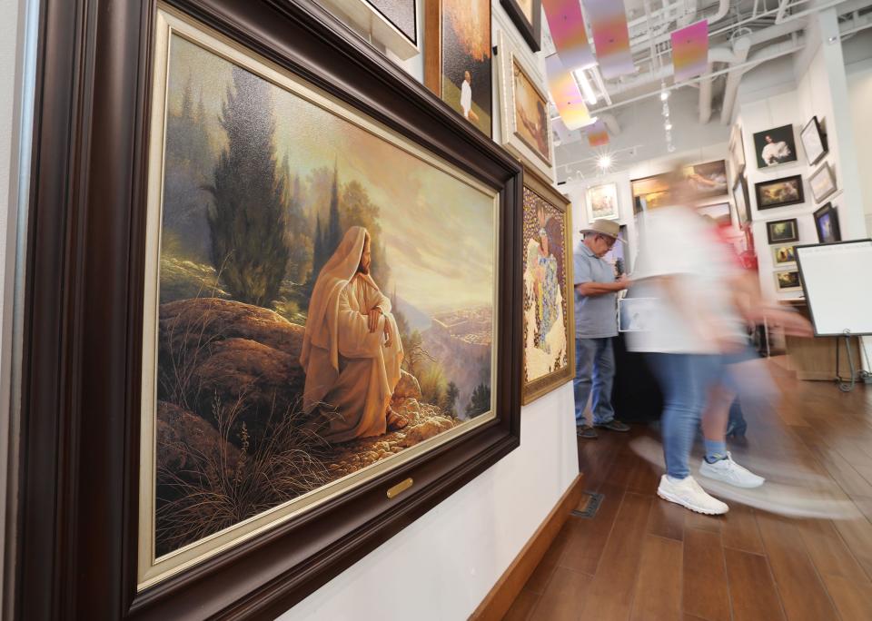 Artist Greg Olsen’s work hangs at the Deseret Book store in Salt Lake City on Friday, Oct. 6, 2023. Deseret Book has signed a deal with Olsen that grants all rights to Olsen’s artwork. | Jeffrey D. Allred, Deseret News