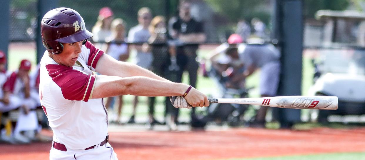 BC High's Cole Bohane swings during a game in the Division 1 state tournament against St. Paul on Monday, June 6, 2022.