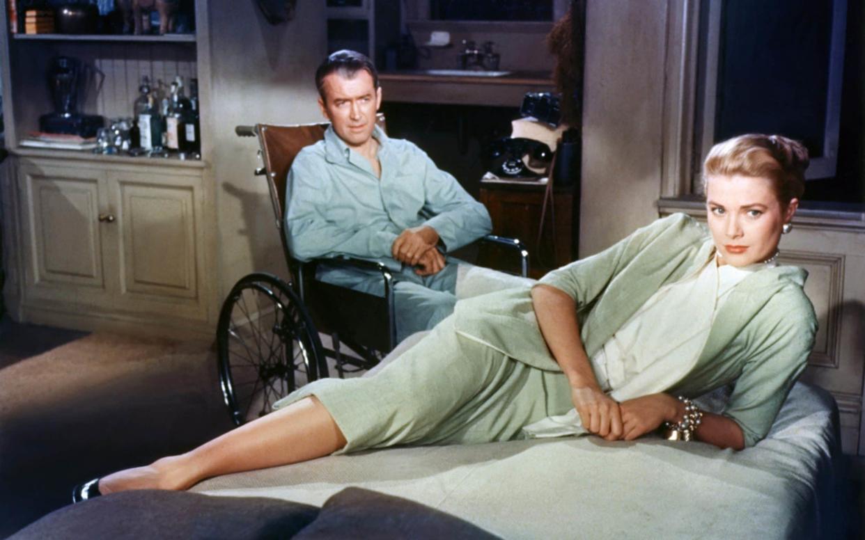 James Stewart and Grace Kelly, confined to the apartment in Hitchcock's Rear Window - Corbis Historical