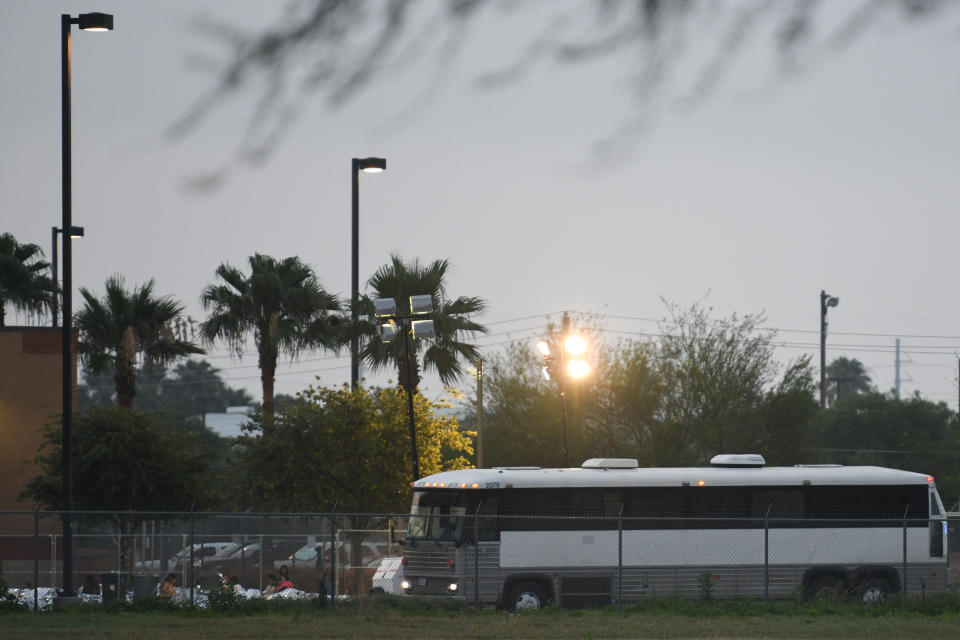 A bus used to transport migrants drives toward a makeshift encampment outside the U.S. Border Patrol McAllen Station in McAllen, Texas, U.S., May 16, 2019.  (Photo: Loren Elliott/Reuters)