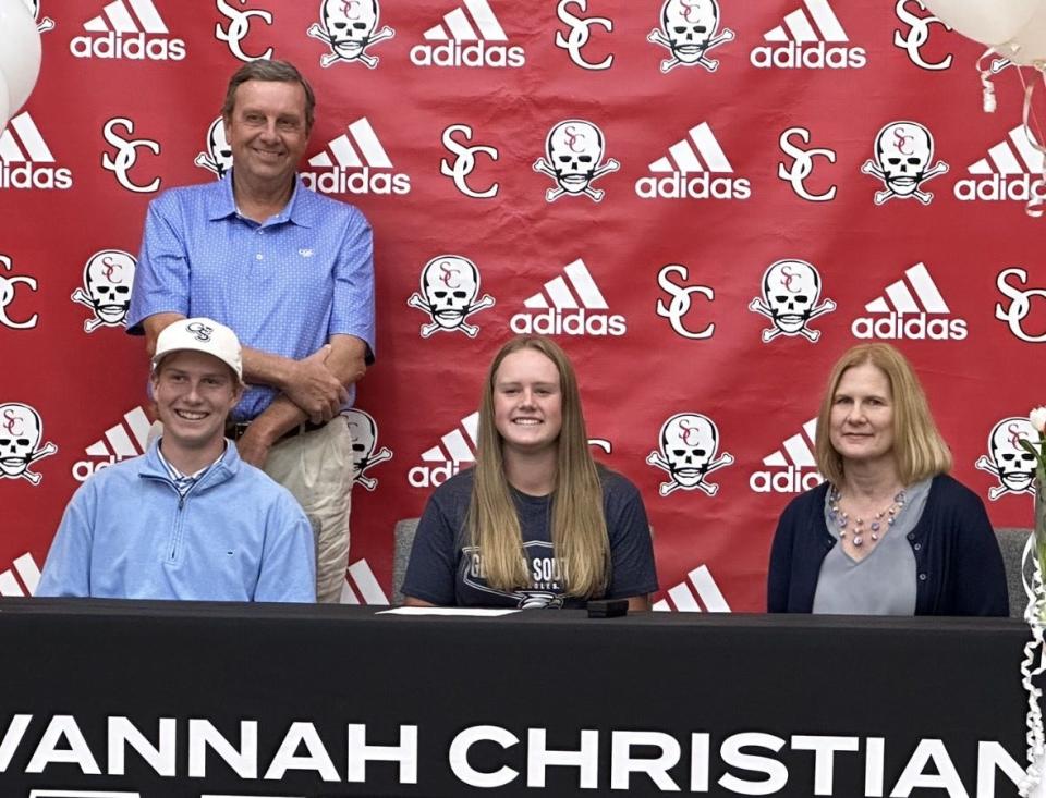 Mary Miller of Savannah Christian, pictured with her family, as she signed to play golf at Georgia Southern on Wednesday.
