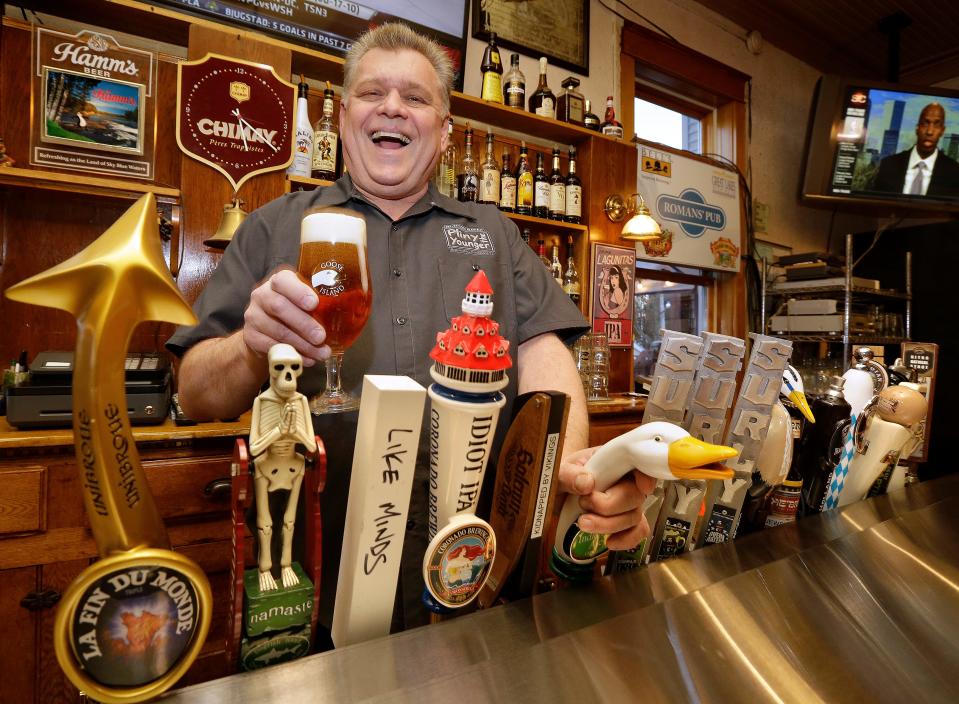 Owner Mike Roman of Romans' Pub. Romans owned the bar for 36 years when this picture was taken in February 2015.