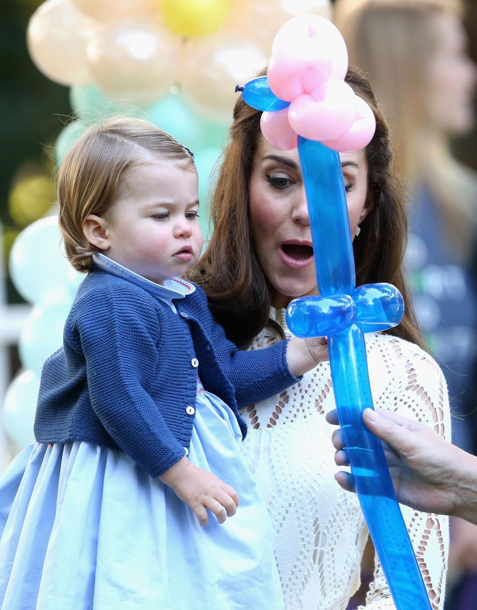 The Duchess of Cambridge with her daughter Princess Charlotte at a children's party for Military families at Government House on Sept. 29, 2016 in Victoria during the Royal Tour of Canada.