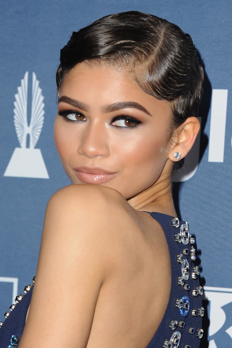 Zendaya is pictured with a finger-waved pixie style haircut as she arrives at the 27th Annual GLAAD Media Awards at The Beverly Hilton Hotel on April 2, 2016 in Beverly Hills, California.