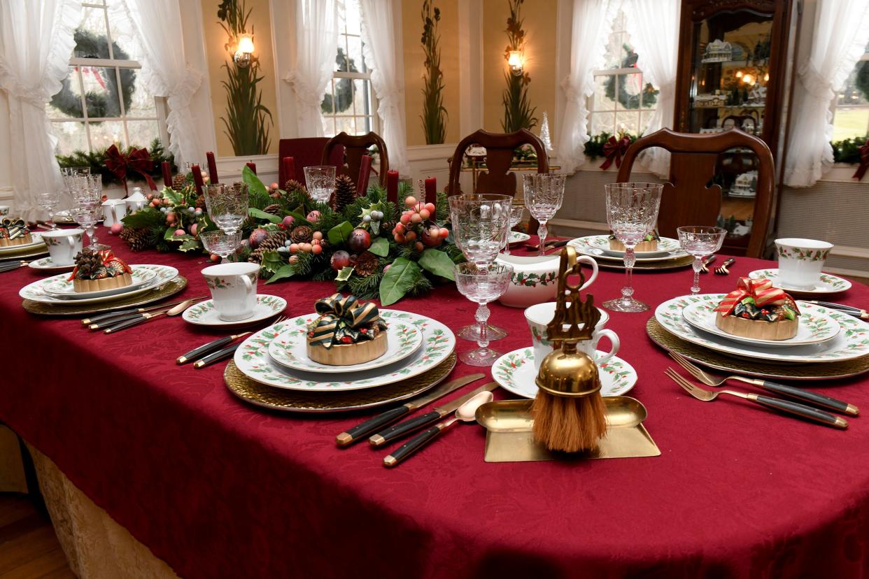 The main dining room of the Stewart Manor House is decorated for the "Welcome Home for the Holidays" and "Deck the Hollow" events at Quail Hollow Park in Lake Township.