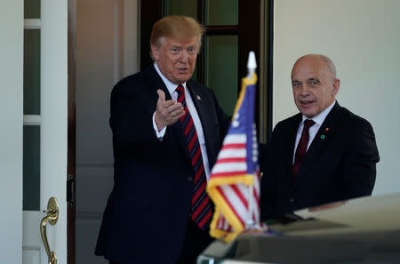 U.S. President Donald Trump welcomes Swiss Federal President Ueli Maurer as he arrives for meetings at the White House in Washington, U.S., May 16, 2019. REUTERS/Joshua Roberts