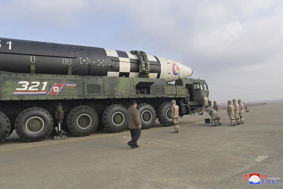 This photo provided on Nov. 19, 2022, by the North Korean government shows North Korean leader Kim Jong Un, left, inspects what it says a Hwasong-17 intercontinental ballistic missile at Pyongyang International Airport in Pyongyang, North Korea, Friday, Nov. 18, 2022. Independent journalists were not given access to cover the event depicted in this image distributed by the North Korean government. The content of this image is as provided and cannot be independently verified. Korean language watermark on image as provided by source reads: "KCNA" which is the abbreviation for Korean Central News Agency. (Korean Central News Agency/Korea News Service via AP)