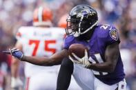 Sep 17, 2017; Baltimore, MD, USA; Baltimore Ravens safety Lardarius Webb (21) reacts after catching an interception in the fourth quarter against the Cleveland Browns at M&T Bank Stadium. Patrick McDermott-USA TODAY Sports