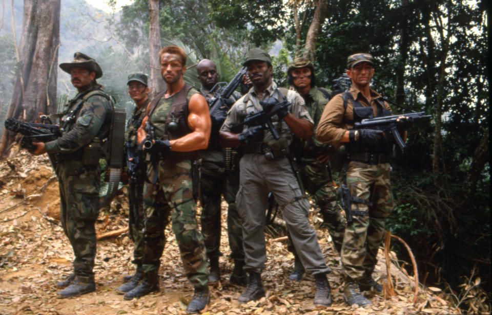 Jesse Ventura, Arnold Schwarzenegger and Carl Weathers on the set of "Predator". (Photo by Sunset Boulevard/Corbis via Getty Images)