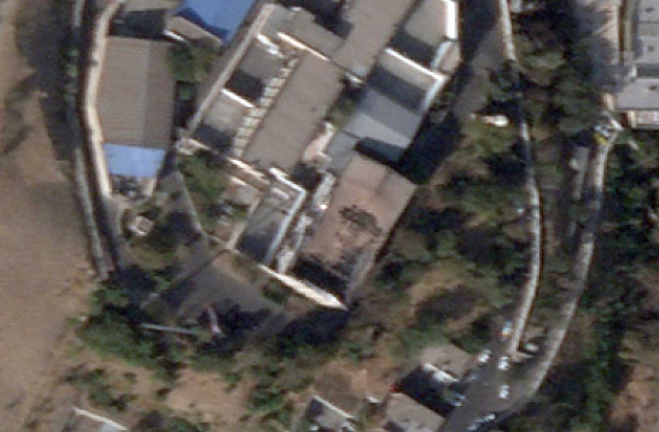 This is a cropped image of the satellite photo from Planet Labs PBC shows Evin prison in Tehran, Iran, Sunday, Oct. 16, 2022, after a fire at the complex amid ongoing national protests in the country. Iran's judiciary raised the death toll Monday, Oct. 17, 2022, in a blaze at the prison, saying that at least eight prisoners were killed. (Planet Labs PBC via AP)