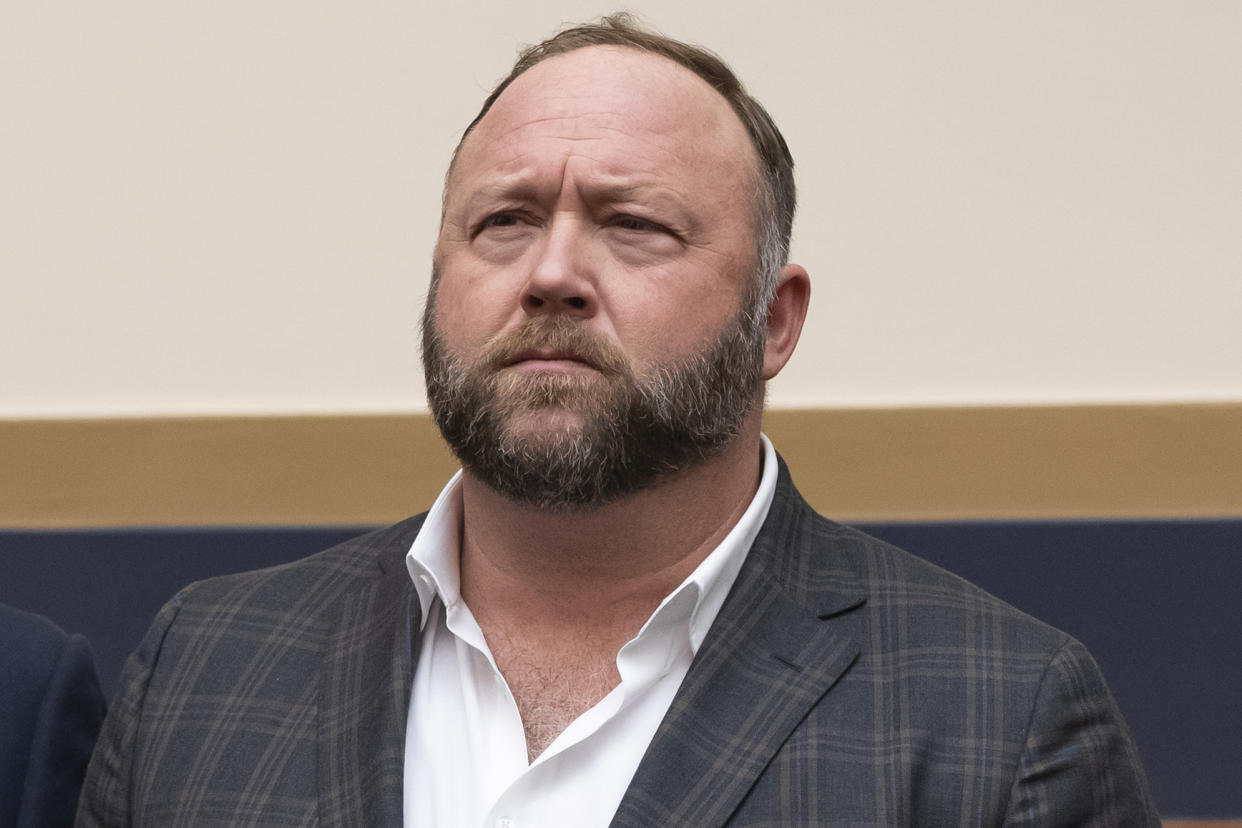 FILE - Infowars host and conspiracy theorist Alex Jones appears at Capitol Hill in Washington on Dec. 11, 2018. Jury selection is set for Monday, July 25, 2022 in a trial that will determine for the first time how much Infowars host Alex Jones must pay Sandy Hook Elementary School parents for falsely telling his audience that the deadliest classroom shooting in U.S. history was a hoax. (AP Photo/J. Scott Applewhite, File)