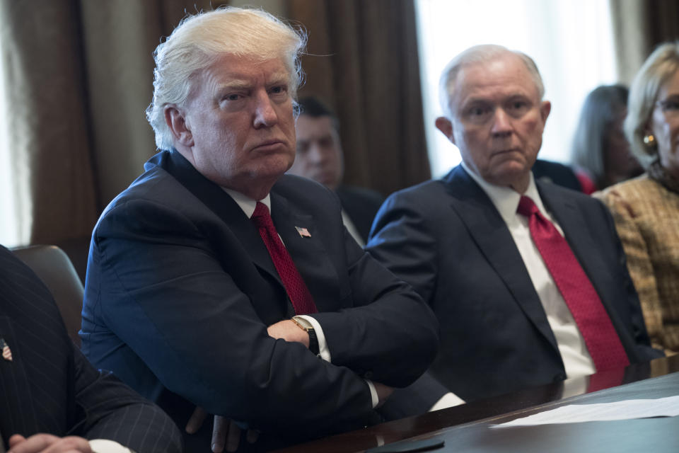 U.S. President Donald Trump (L) and Attorney General Jeff Sessions (R) attend a panel discussion on an opioid and drug abuse in the Roosevelt Room of the White House March 29, 2017 in Washington, DC. (Photo by Shawn Thew-Pool/Getty Images)