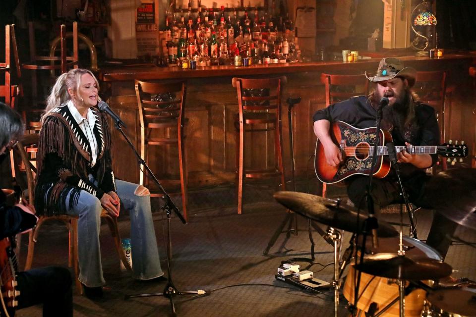 <p>The country legends played a stripped-down set at Nashville’s iconic Bluebird Cafe, performing Stapleton’s ode to his late dog, “Maggie’s Song.” Stapleton's wife Morgane was supposed to sing with him, but had to <a href="https://people.com/country/acm-awards-2021-morgane-stapleton-to-miss-performance-doula-commitment-miranda-lambert-replaces/" rel="nofollow noopener" target="_blank" data-ylk="slk:bow out last minute;elm:context_link;itc:0;sec:content-canvas" class="link ">bow out last minute</a> due to a "prior doula commitment." </p>