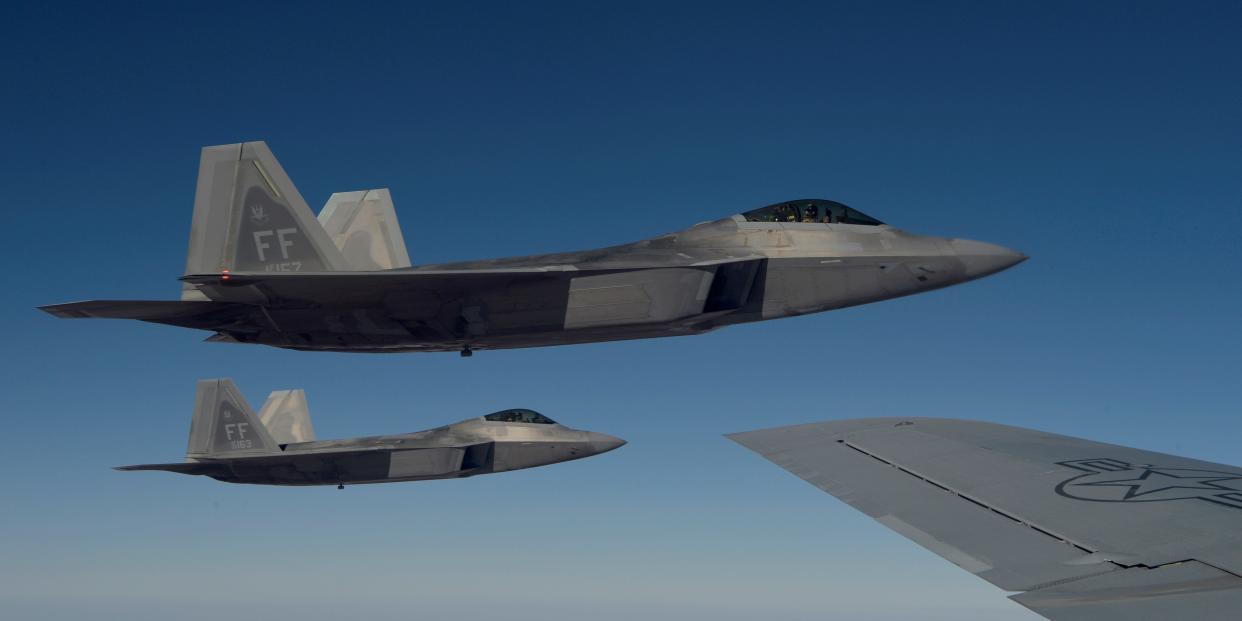 pair of f-22 raptors