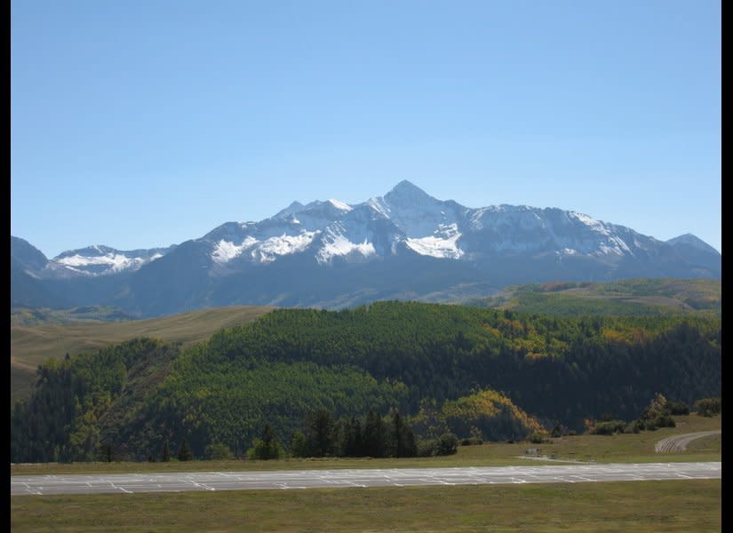 Telluride's airport sits on a plateau above the San Miguel River and is higher than any other commercial airport in North America. Touch-and-go landings are prohibited, so pilots only have one shot to land on the runway, which dips in the middle.