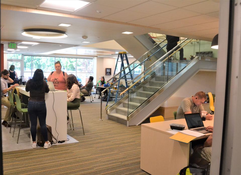 Students gather between classes in the new, 8,000-square foot Adult Learner and Veteran Services office in Colorado State University's Lory Student Center.