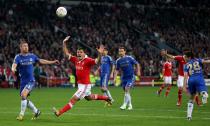 Benfica's Rodrigo Lima (centre) appeals after a handball by Chelsea's Cesar Azpilicueta (right)