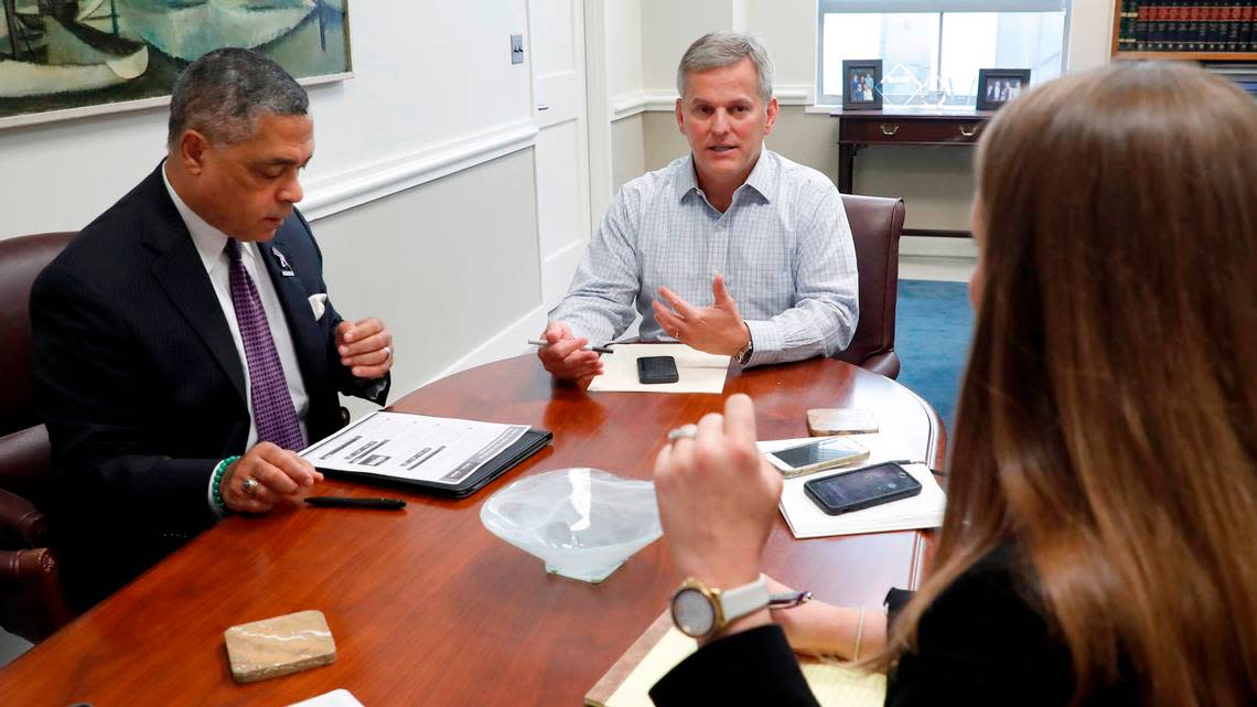 North Carolina Attorney General Josh Stein, center, meets with top aides including criminal bureau chief Leslie Cooley Dismukes, right, and civil bureau chief Reuben Young in Raleigh on July 29, 2021.