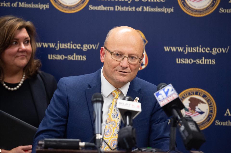 U.S. Attorney Darren LaMarca announces six former law enforcement officers have pleaded guilty to charges related to the beating and sexual assault of two Black men. The news conference followed court hearings at the Thad Cochran United States Courthouse in Jackson, Miss., Thursday, Aug. 3, 2023. At left is Deputy Attorney General Mary Helen Wall.