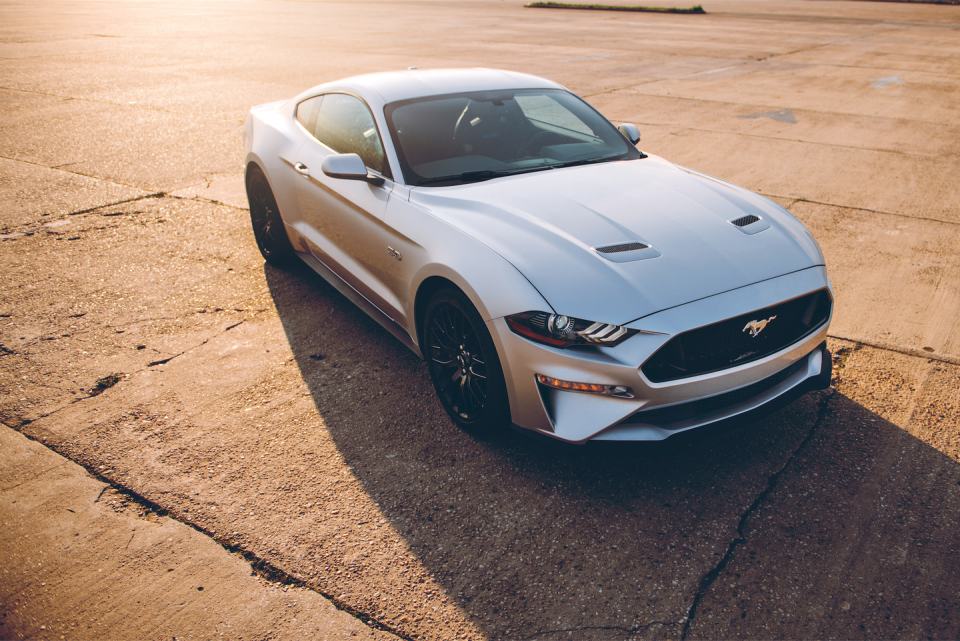 <p><a href="https://www.roadandtrack.com/new-cars/first-drives/a13527914/2018-ford-mustang-gt-review/" rel="nofollow noopener" target="_blank" data-ylk="slk:The new Mustang;elm:context_link;itc:0;sec:content-canvas" class="link ">The new Mustang</a> makes a great all-rounder, with plenty of modern tech and comfort-minded features. We'd recommend going for the Performance Pack 1—it has enough capability for track use, and isn't as hardcore as the more expensive <a href="https://www.roadandtrack.com/new-cars/future-cars/a13069178/2018-ford-mustang-gt-performance-package-level-2-info-photos/" rel="nofollow noopener" target="_blank" data-ylk="slk:Performance Pack 2;elm:context_link;itc:0;sec:content-canvas" class="link ">Performance Pack 2</a>. If you're into special editions, <a href="https://www.ebay.com/itm/2019-Ford-Mustang-BULLITT/163941834763?hash=item262bb1e00b:g:GO4AAOSwwnNdl7BK" rel="nofollow noopener" target="_blank" data-ylk="slk:this Bullitt Mustang;elm:context_link;itc:0;sec:content-canvas" class="link ">this Bullitt Mustang</a> is up for grabs right now. </p>