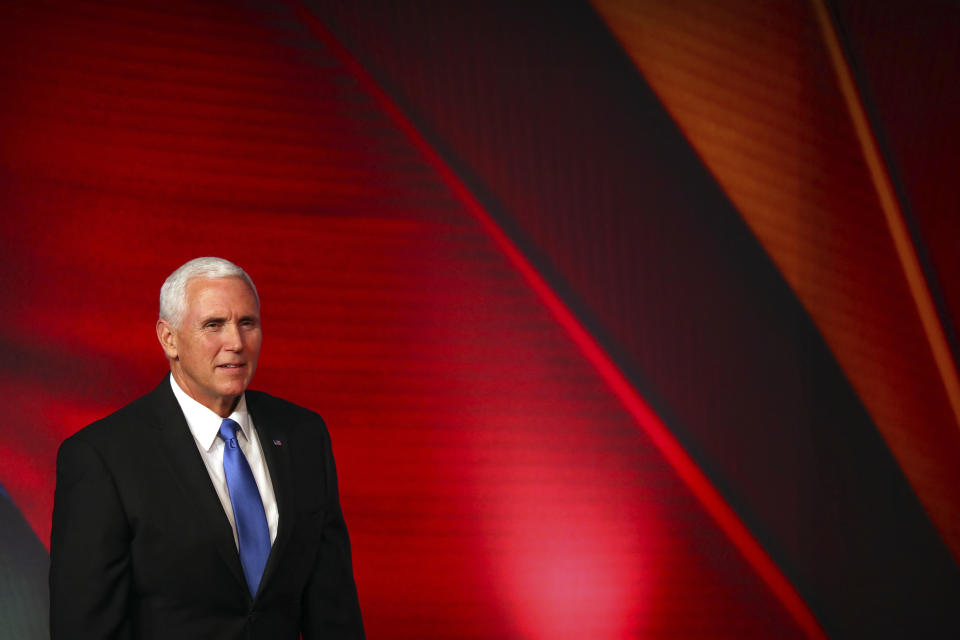 U.S. Vice President Mike Pence arrives to speak at the APEC CEO Summit at the Pacific Explorer cruise ship docked in Port Moresby, Papua New Guinea, Saturday, Nov. 17, 2018. (AP Photo/Mark Schiefelbein)