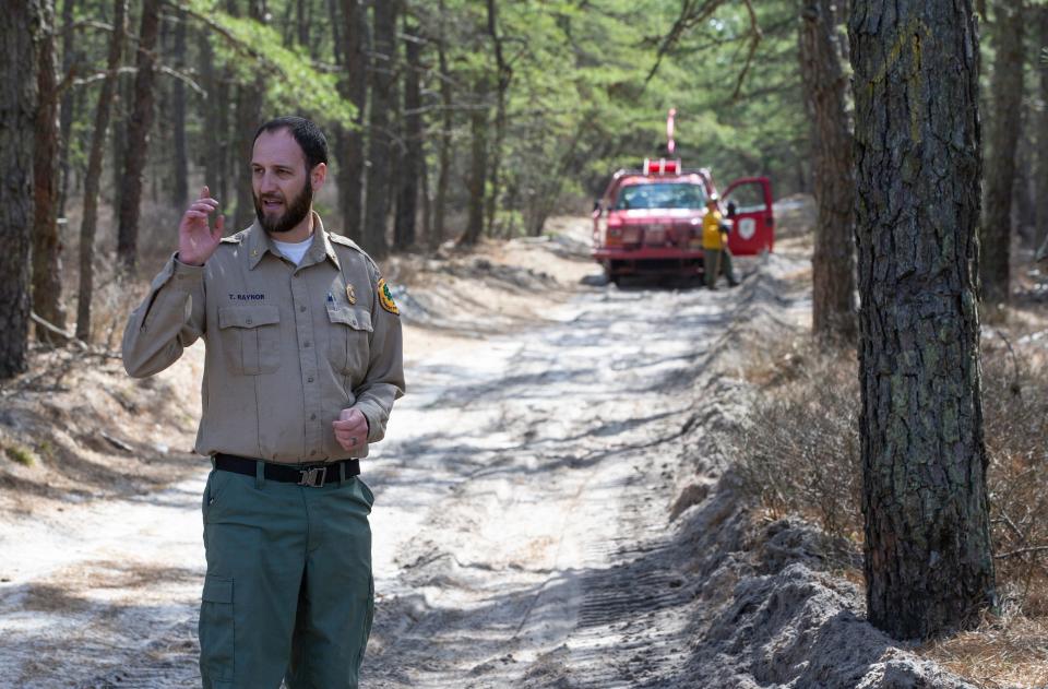 NJ Forest Fire Service members ignite the dense fuel on the ground in the area of Roosevelt City. Local and state officials join members of the New Jersey Forest Fire Service in the Roosevelt City section of Manchester Township to demonstrate a prescribed burn. This is a preventive action taken to protect people and structures in the area.   
Manchester, NJ
Wednesday, March 13, 2024