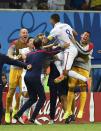 Clint Dempsey of the U.S. (2nd R) celebrates after scoring a goal with teammates during their 2014 World Cup G soccer match against Portugal at the Amazonia arena in Manaus June 22, 2014. REUTERS/Dylan Martinez