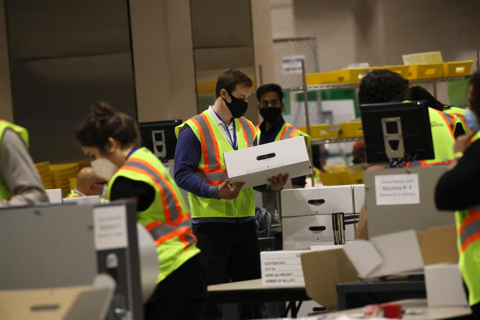 Election workers count ballots on Wednesday in Philadelphia. Despite the president's unfounded claims, voting appeared to go fairly smoothly in Pennsylvania.  (Photo: Spencer Platt via Getty Images)