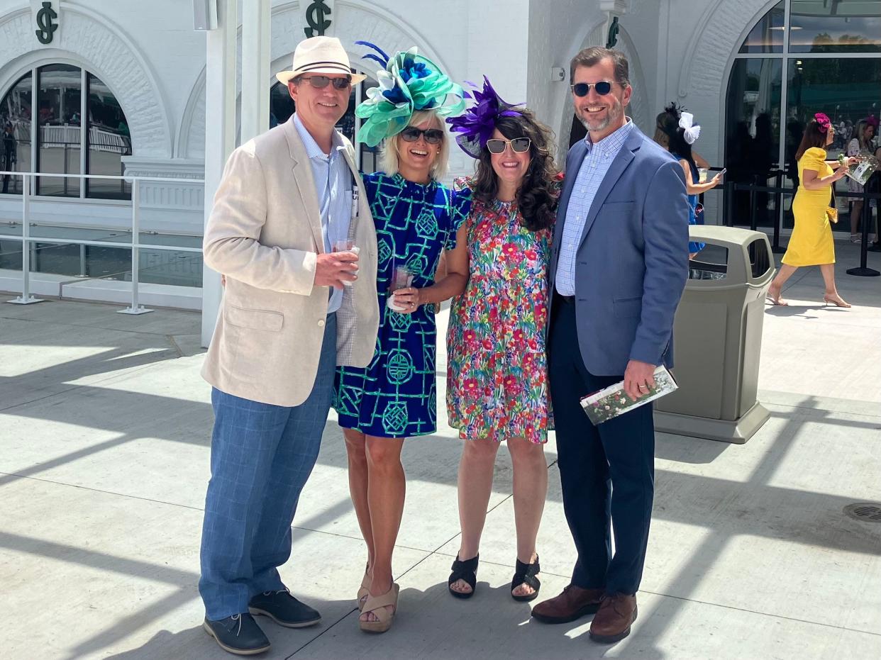 Tom and Julie O'Neill, and Matt and Missy Bearden pose on the new paddock on 502'sDay, which is the Tuesday before the Kentucky Derby. The group of friends, who live in Louisville, have moved up their Kentucky Derby week track festivities over the years.