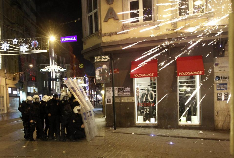 Riot police take position as they clash with demonstrators during a protest against internet censorship in Istanbul