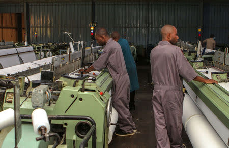 Workers are seen at the the Utexrwa garment factory in Kigali, Rwanda April 17, 2018. Picture taken April 17, 2018. REUTERS/Jean Bizimana