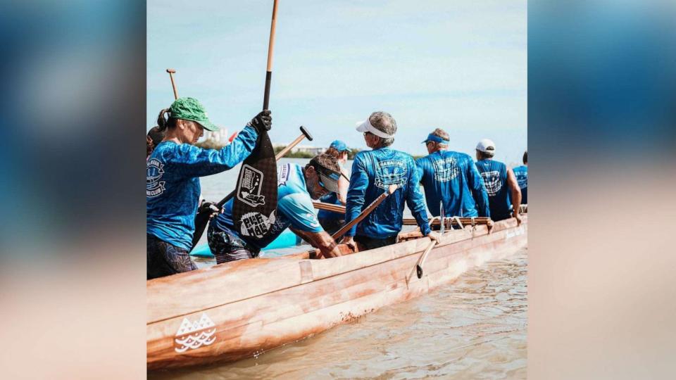 PHOTO: Members of the Hawaiian Canoe Club showed up to help battle the flames in Kula with whatever water and tools they could find. (Cody Lang)