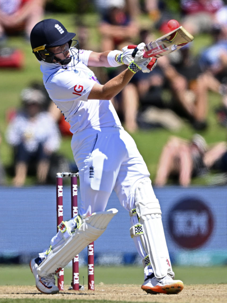 England's England's Ollie Pope bats against New Zealand on the third day of their cricket test match in Tauranga, New Zealand, Saturday, Feb. 18, 2023. (Andrew Cornaga/Photosport via AP)