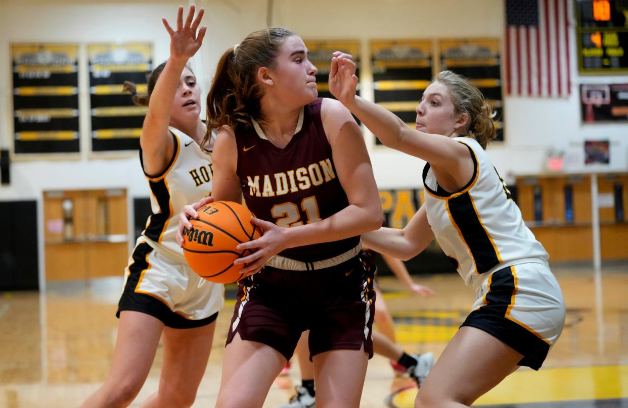 Charlotte Tuhy of Madison tries to get the ball past the Hanover Park defense. Tuesday, January 10, 2023 Mandatory Credit: Kevin R. Wexler-The Record